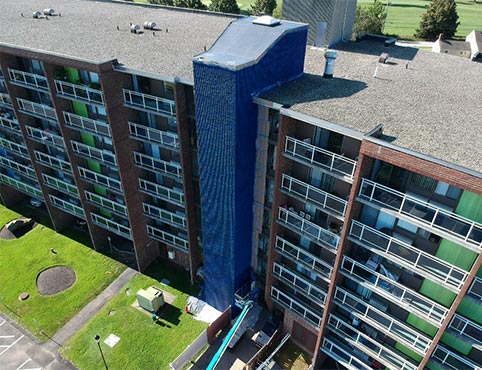 An apartment complex in the process of exterior painting with Benjamin Moore paints. An apartment complex in the process of exterior painting with Benjamin Moore paints.