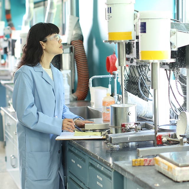 A Benjamin Moore employee working in the lab. A Benjamin Moore employee working in the lab.