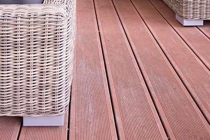 Wood deck with wicker furniture Wood deck with wicker furniture