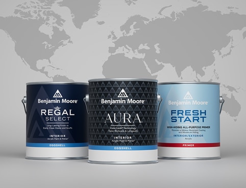 Cans of Benjamin Moore paint are presented in front of a global map. Cans of Benjamin Moore paint are presented in front of a global map.
